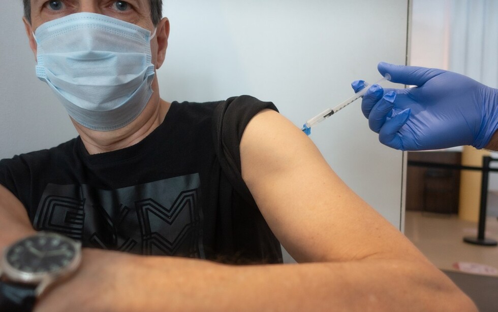 People_being_vaccinated_against_COVID-19