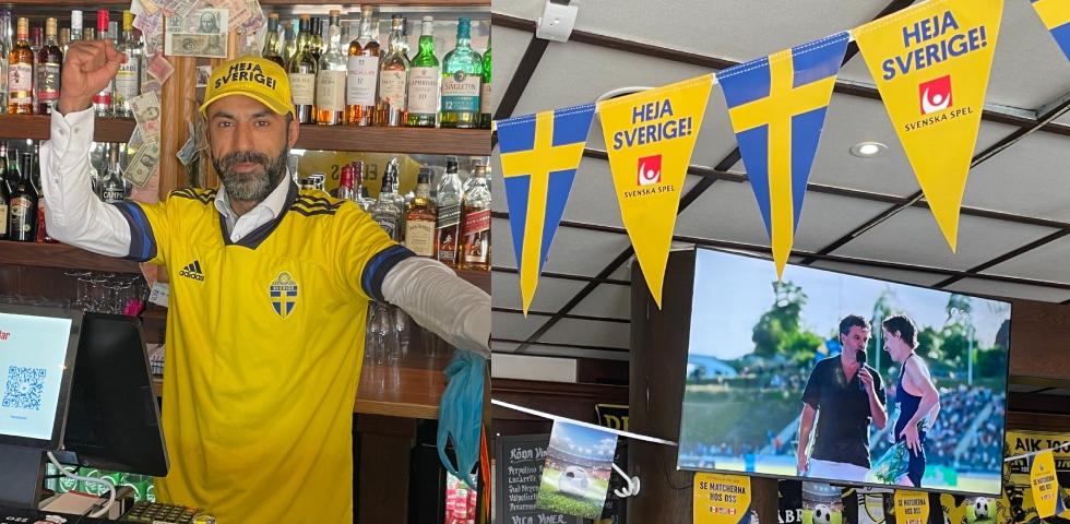 Man klädd i Sveriges matchtröja och jilanger med sveriges flaggor och en teve