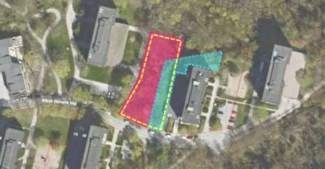 Aerial image of a housing complex with color‑coded overlays: a red-outlined curved block, a green rectangle, and a teal triangular area marking zones.